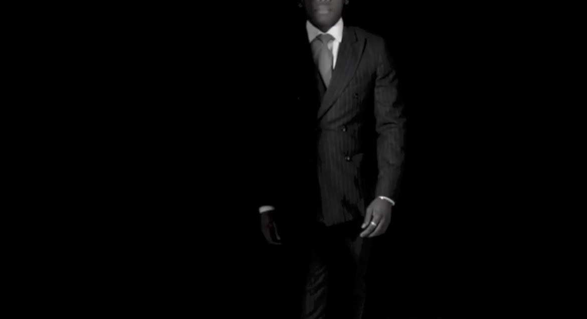 Client in a double-breasted pinstripe suit